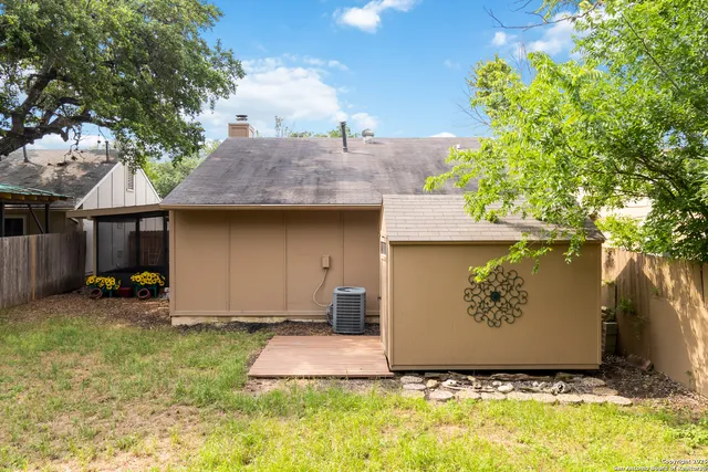a view of backyard of house