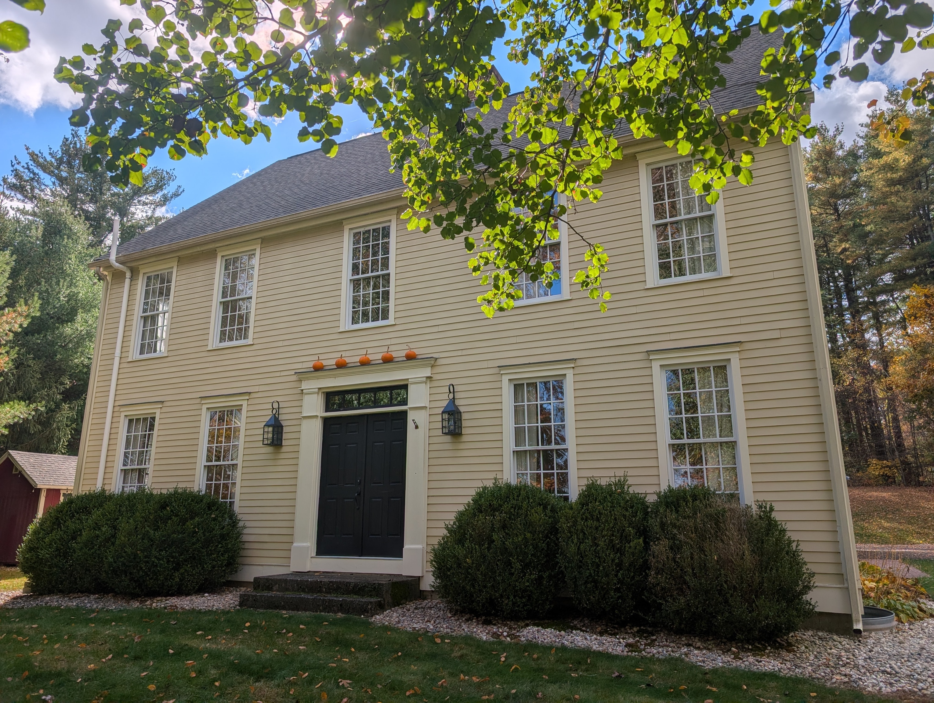 23 Strawberry Fields Road Granby, CT 06035 - Photo 1 of 1 a house that has a tree in front of the house