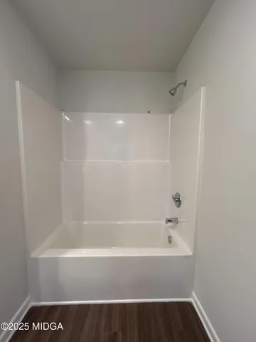 a bathroom with a sink and vanity