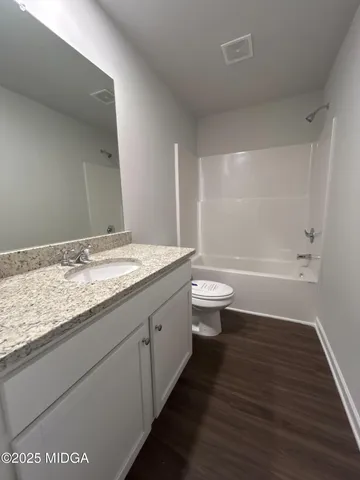 a close up of a bathtub in a bathroom