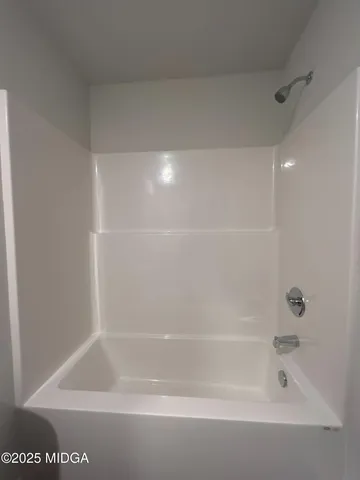 a close view of a sink and a mirror