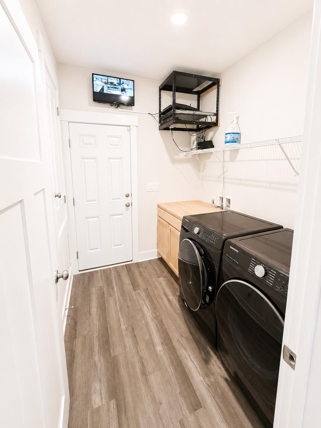 734 Quintana Street Crestview, FL 32539 - Photo 15 of 16 a utility room with dryer and washer
