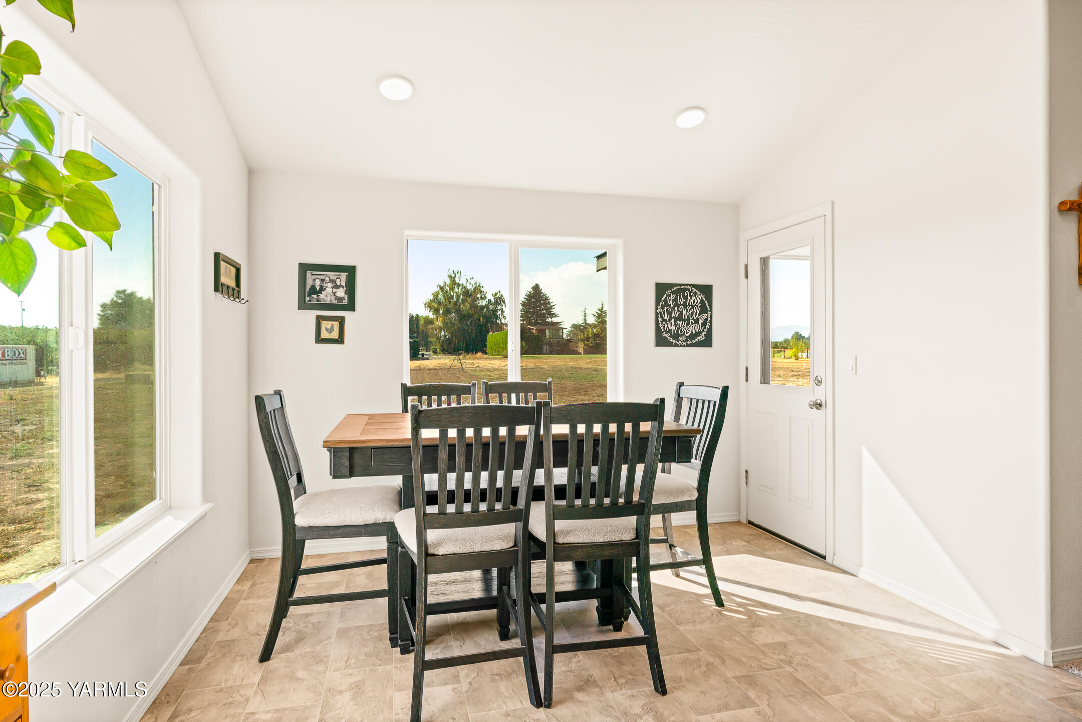 12312 Nelson Road Yakima, WA 98903 - Photo 13 of 36 a view of a dining room with furniture window and outside view