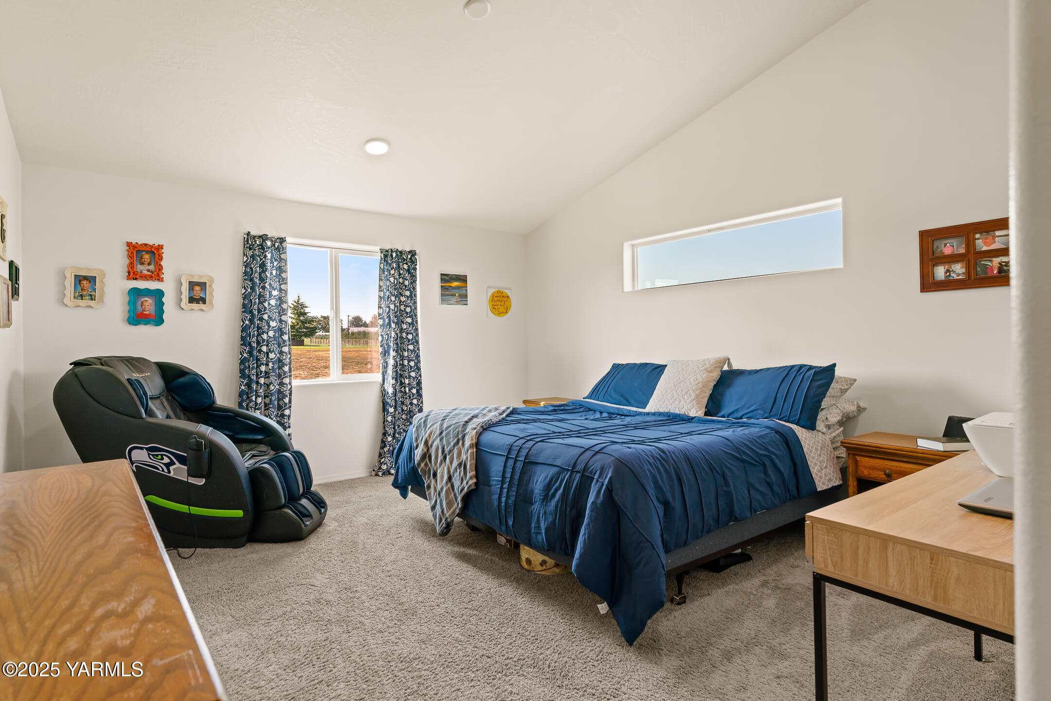 12312 Nelson Road Yakima, WA 98903 - Photo 14 of 36 a spacious bedroom with a bed and window