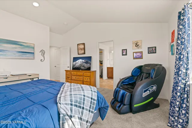 a bedroom with furniture and a bed