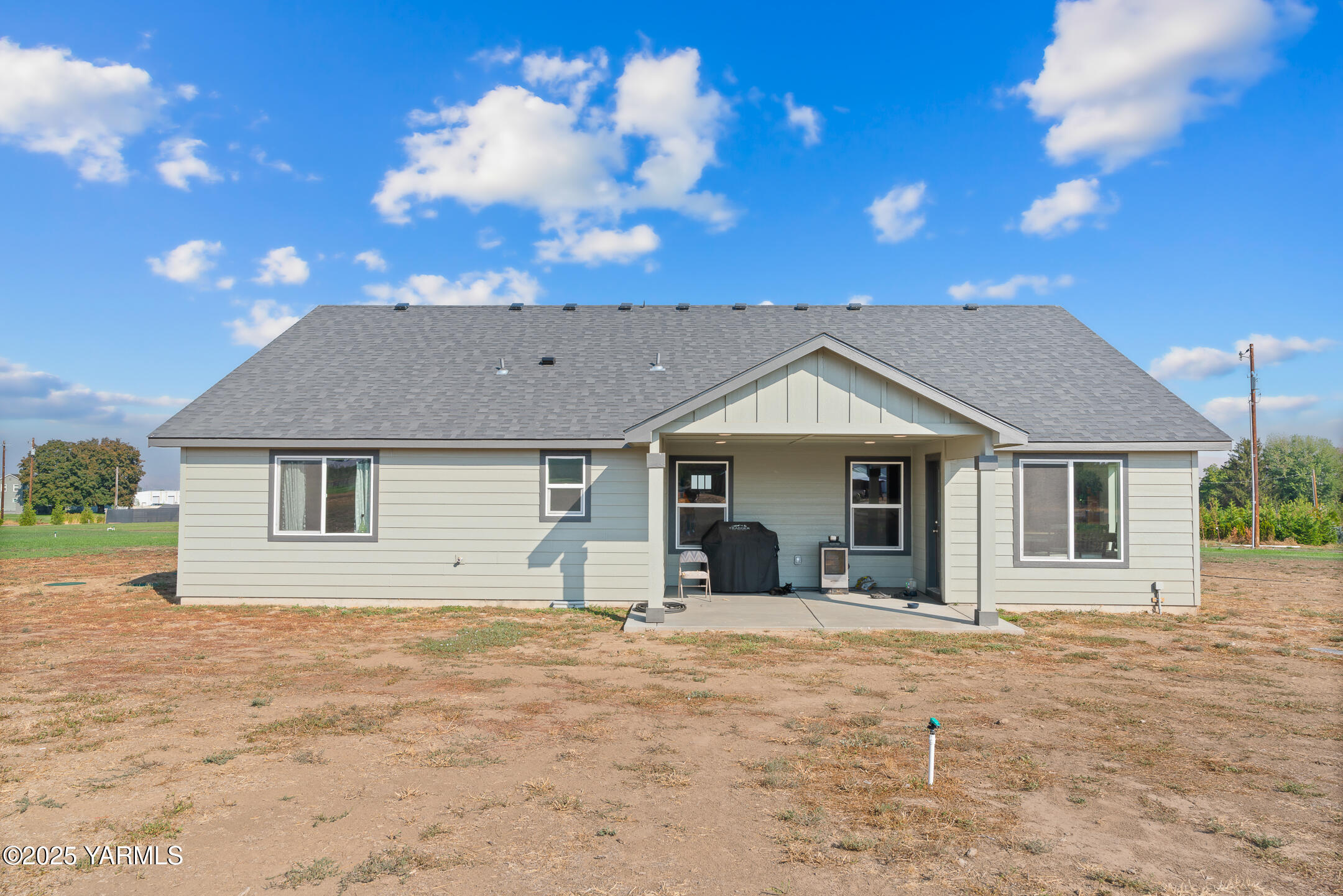 12312 Nelson Road Yakima, WA 98903 - Photo 27 of 36 a view of a house with a yard