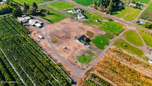 an aerial view of a house a garden