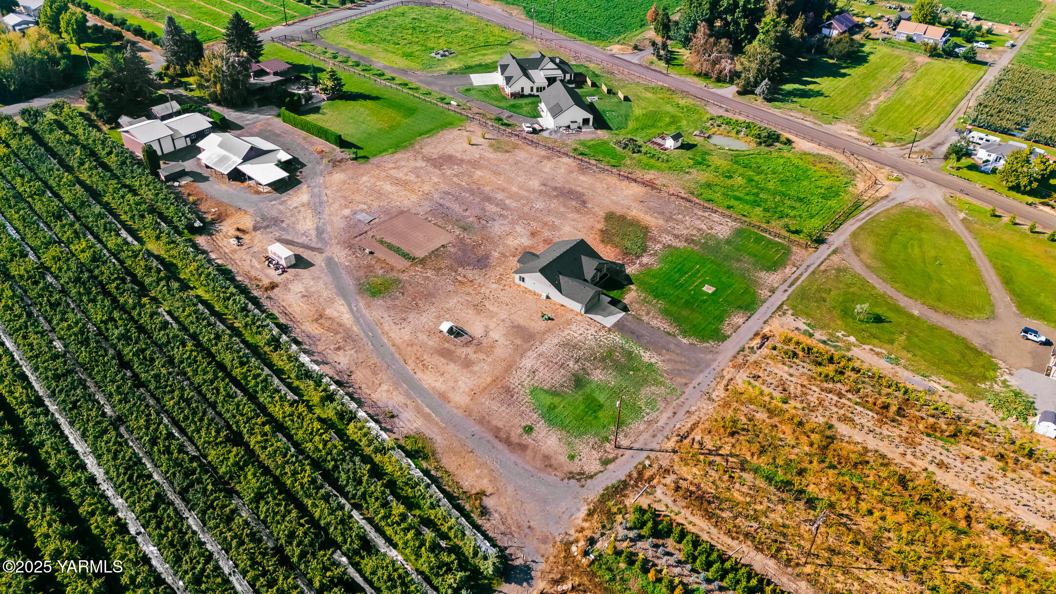12312 Nelson Road Yakima, WA 98903 - Photo 36 of 36 an aerial view of a house a garden