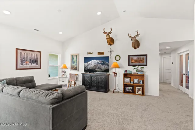 a living room with furniture and a couch