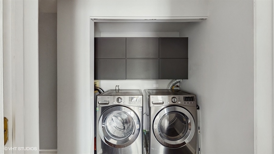 210 North Addison Avenue, Unit 202 Elmhurst, IL 60126 - Photo 13 of 21 a utility room with dryer and washer