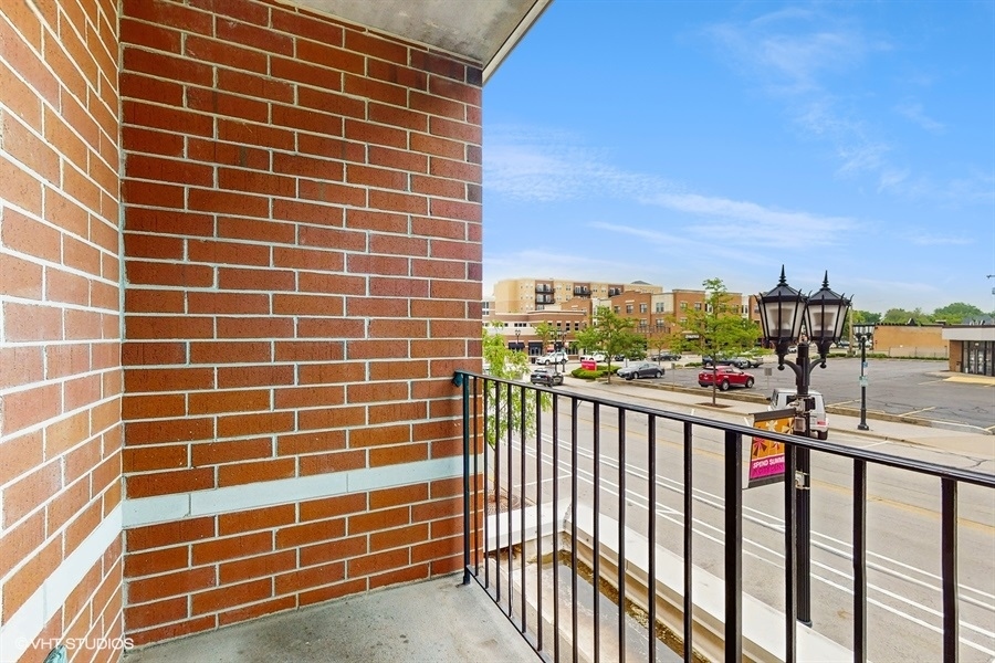 210 North Addison Avenue, Unit 202 Elmhurst, IL 60126 - Photo 16 of 21 a view of a balcony with city view