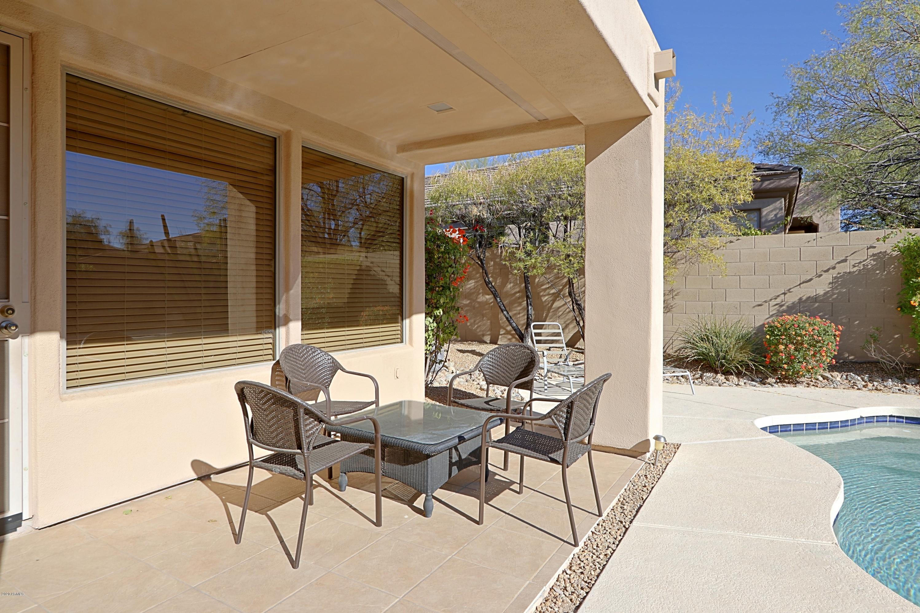 6803 East Eagle Feather Road Scottsdale, AZ 85266 - Photo 33 of 67 a outdoor space with furniture