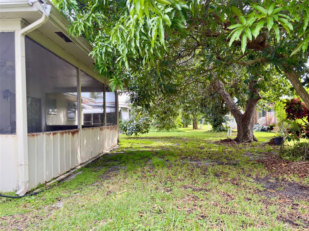 4510 Northwest 46th Street Tamarac, FL 33319 - Photo 23 of 34 a view of backyard with green space