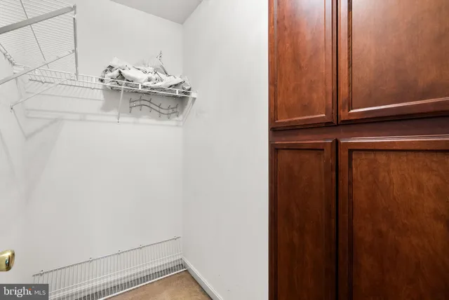 a view of kitchen with an entryway