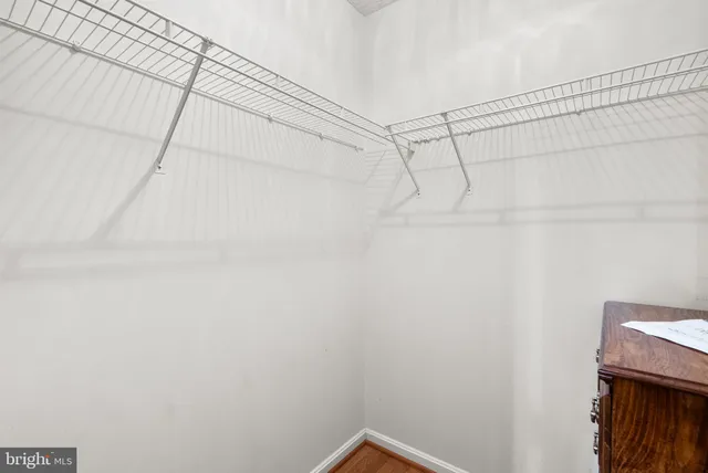 a bathroom with a shower curtain and a shower curtain