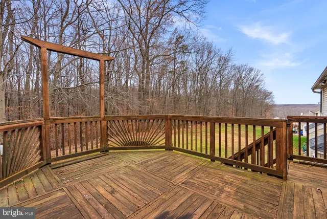 a balcony with trees in front of it