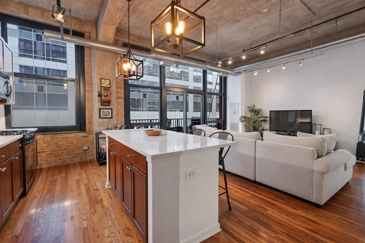 210 South Desplaines Street, Unit 404 Chicago, IL 60661 - Photo 2 of 22 a large white kitchen with a large window