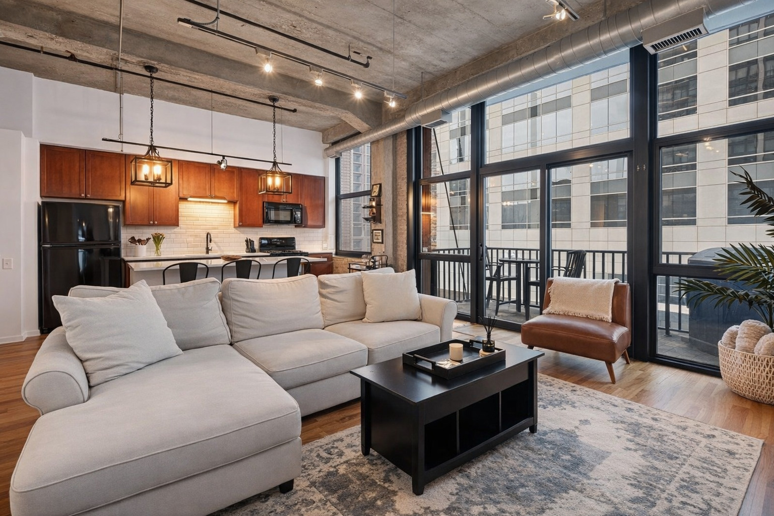 210 South Desplaines Street, Unit 404 Chicago, IL 60661 - Photo 6 of 22 a living room with furniture ceiling fan and a rug