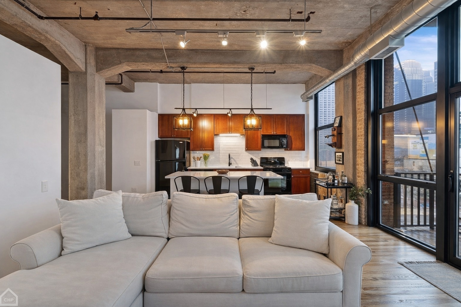 210 South Desplaines Street, Unit 404 Chicago, IL 60661 - Photo 7 of 22 a living room with furniture