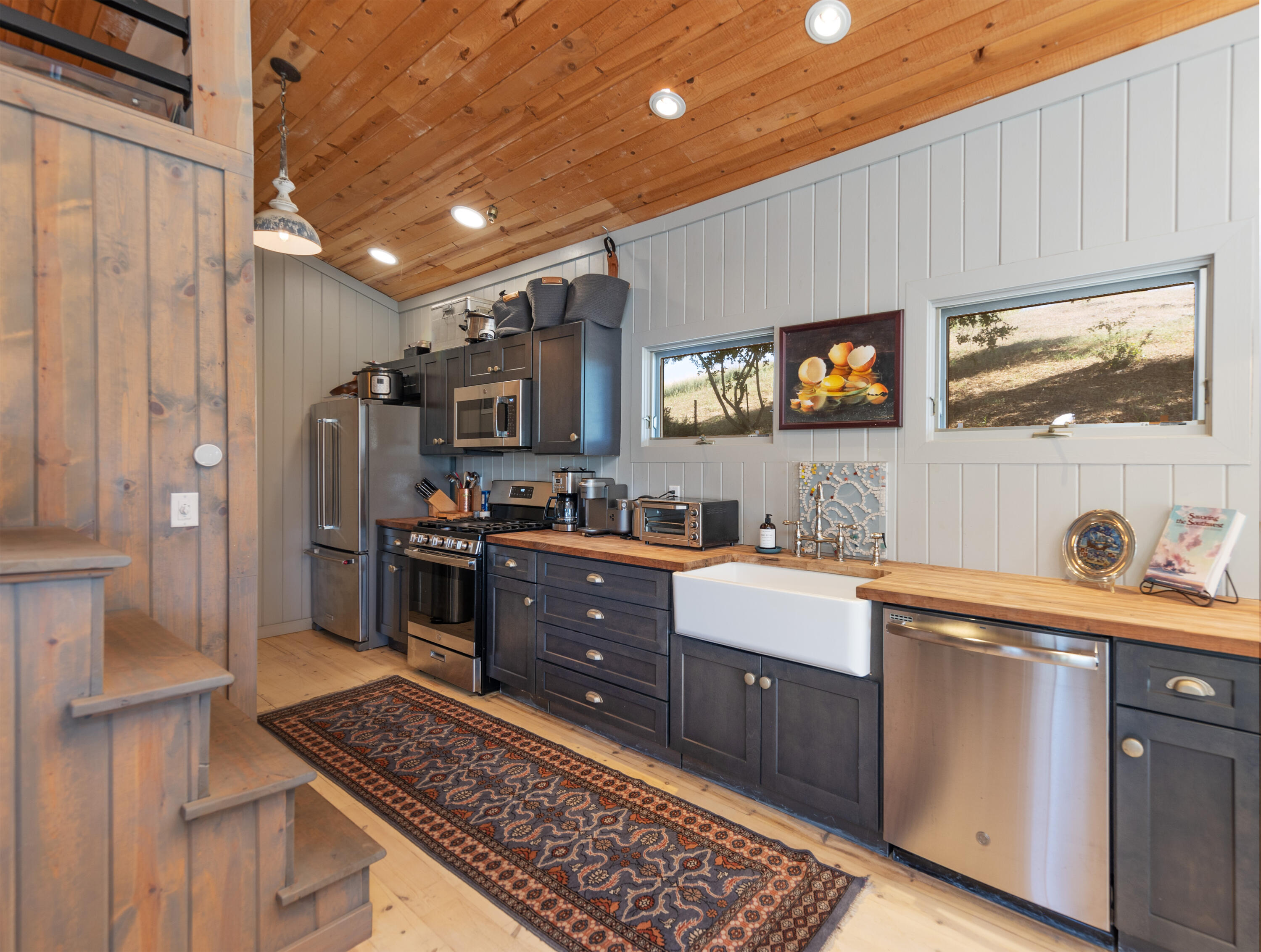 4001 Long Valley Road Santa Ynez, CA 93460 - Photo 32 of 43 a kitchen with a sink appliances and cabinets