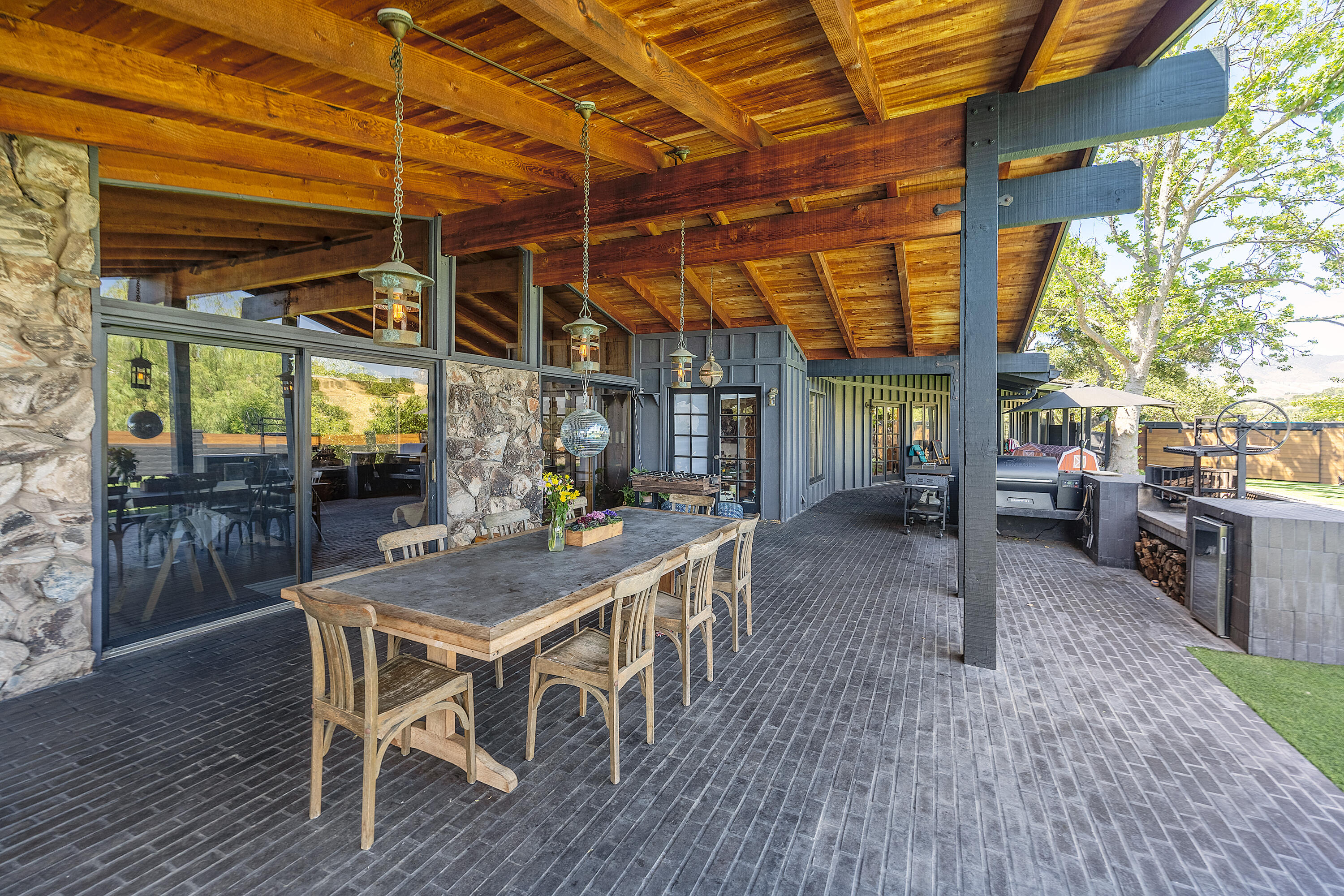 4001 Long Valley Road Santa Ynez, CA 93460 - Photo 4 of 43 a view of a dinning table and chairs in the patio