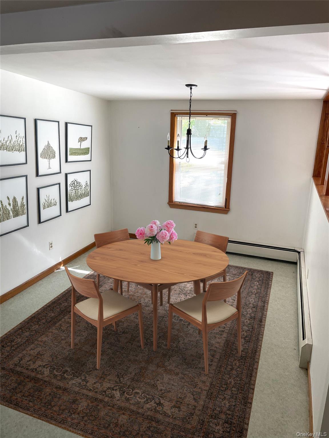 67 Bethlehem Road New Windsor, NY 12553 - Photo 9 of 19 AI generated: Carpeted dining space with a chandelier and a baseboard radiator