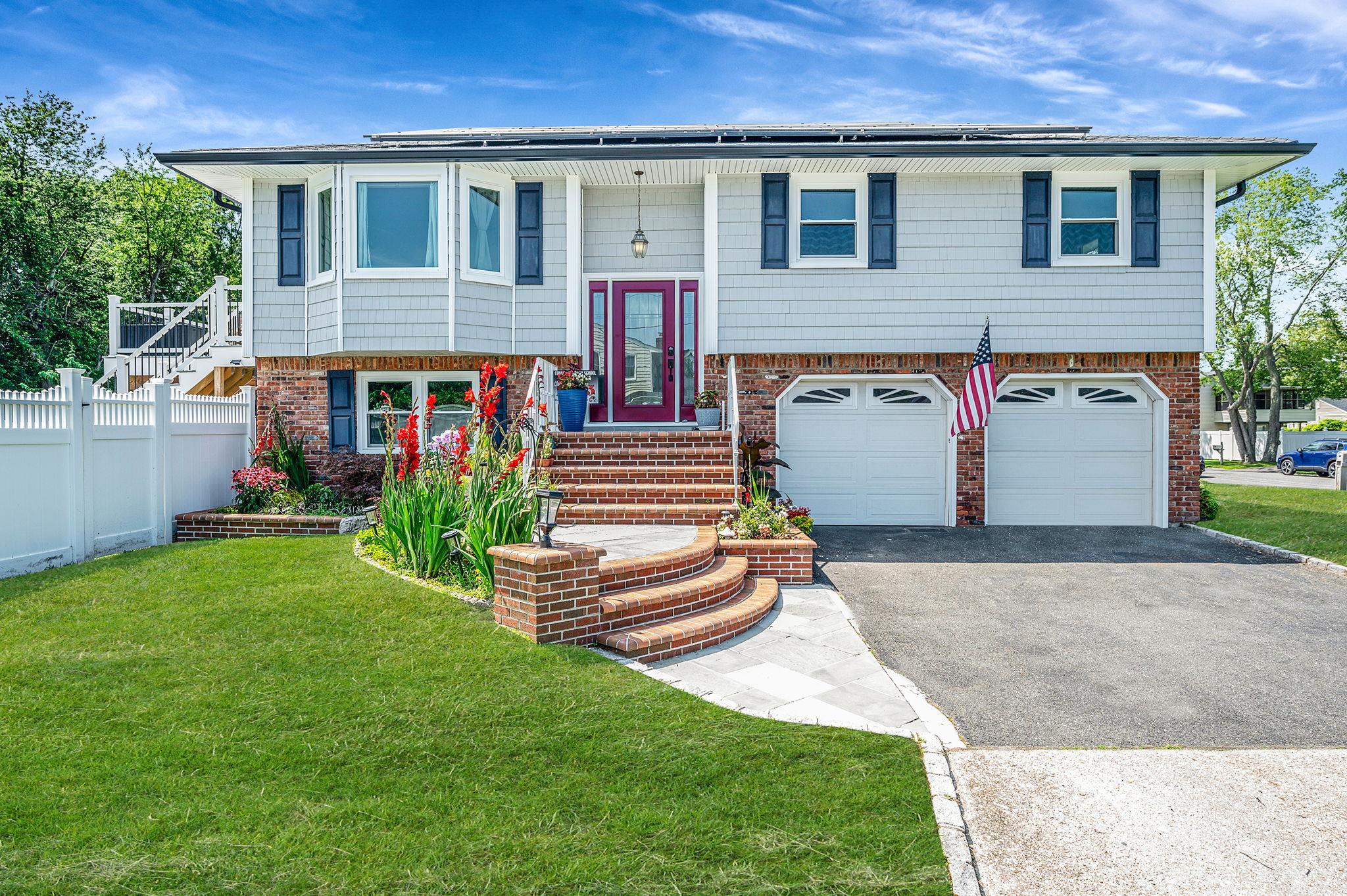 front view of house with a yard