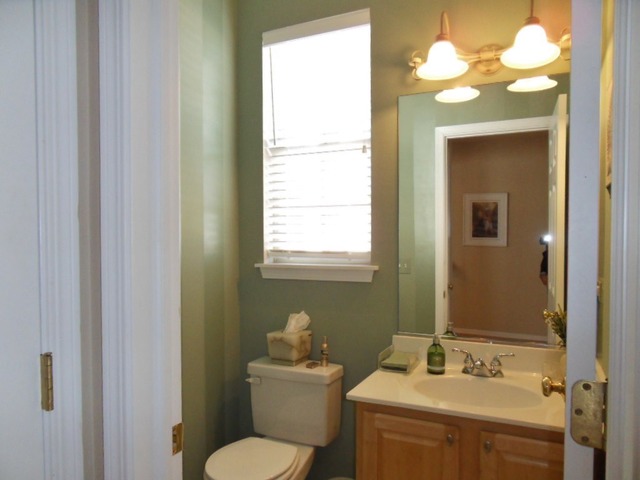 1907 Wagner Road, Unit 1907 Batavia, IL 60510 - Photo 14 of 22 a bathroom with a toilet sink and mirror