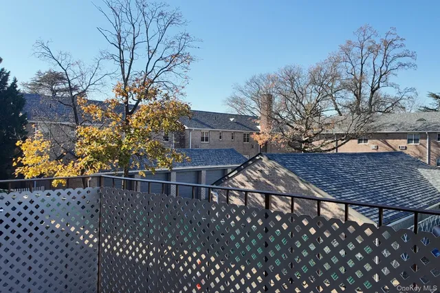 a view of street with parked cars