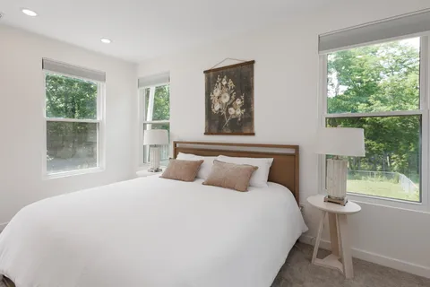 a view of an empty room with windows