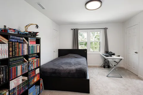 a view of a lake with a yard