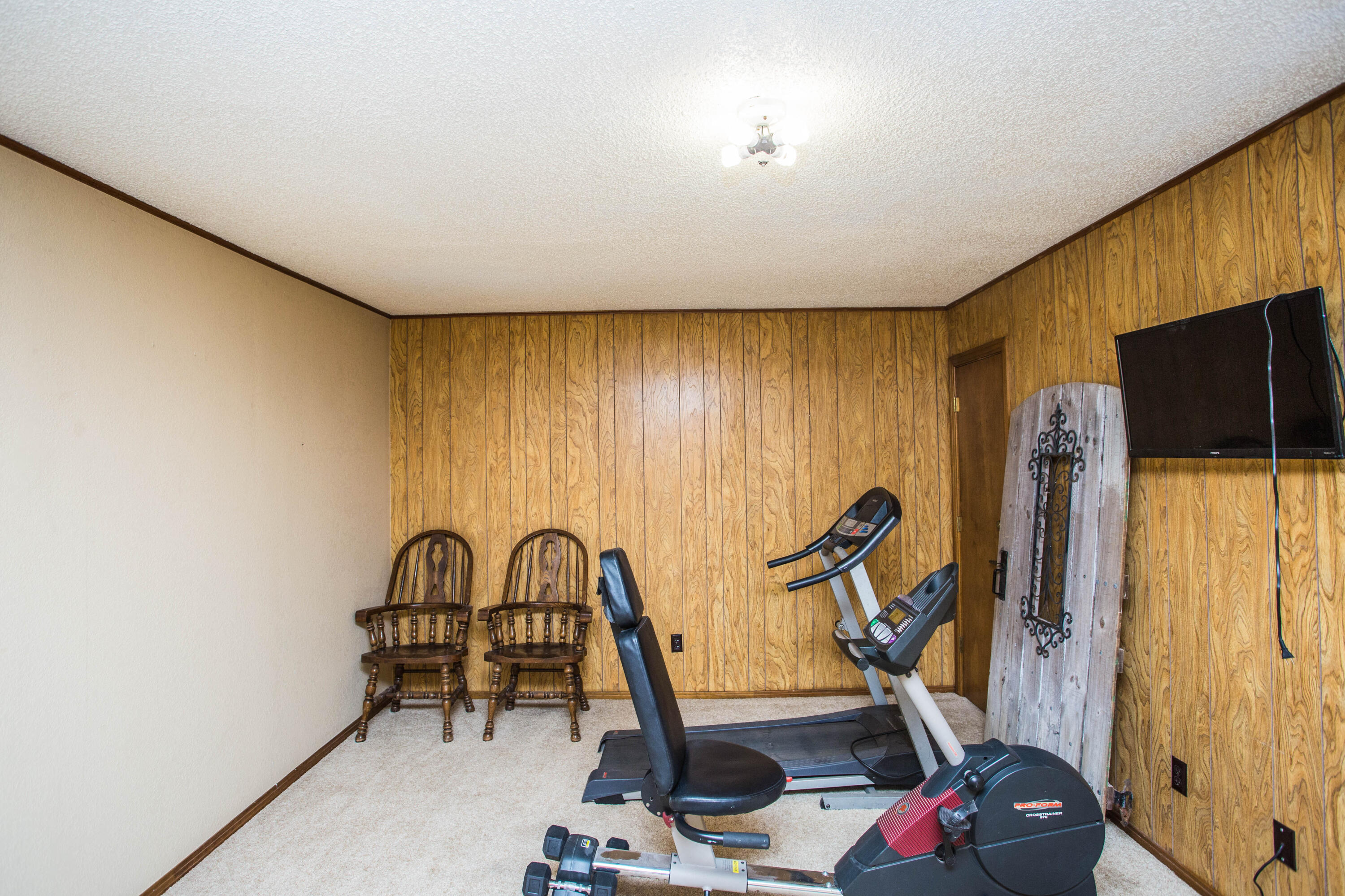 1304 Jefferson Drive Plainview, TX 79072 - Photo 41 of 50 a view of a room with gym equipment