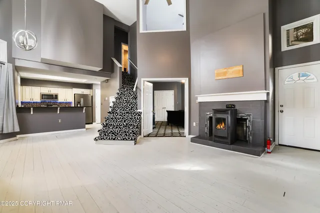 a view of a livingroom with a fireplace