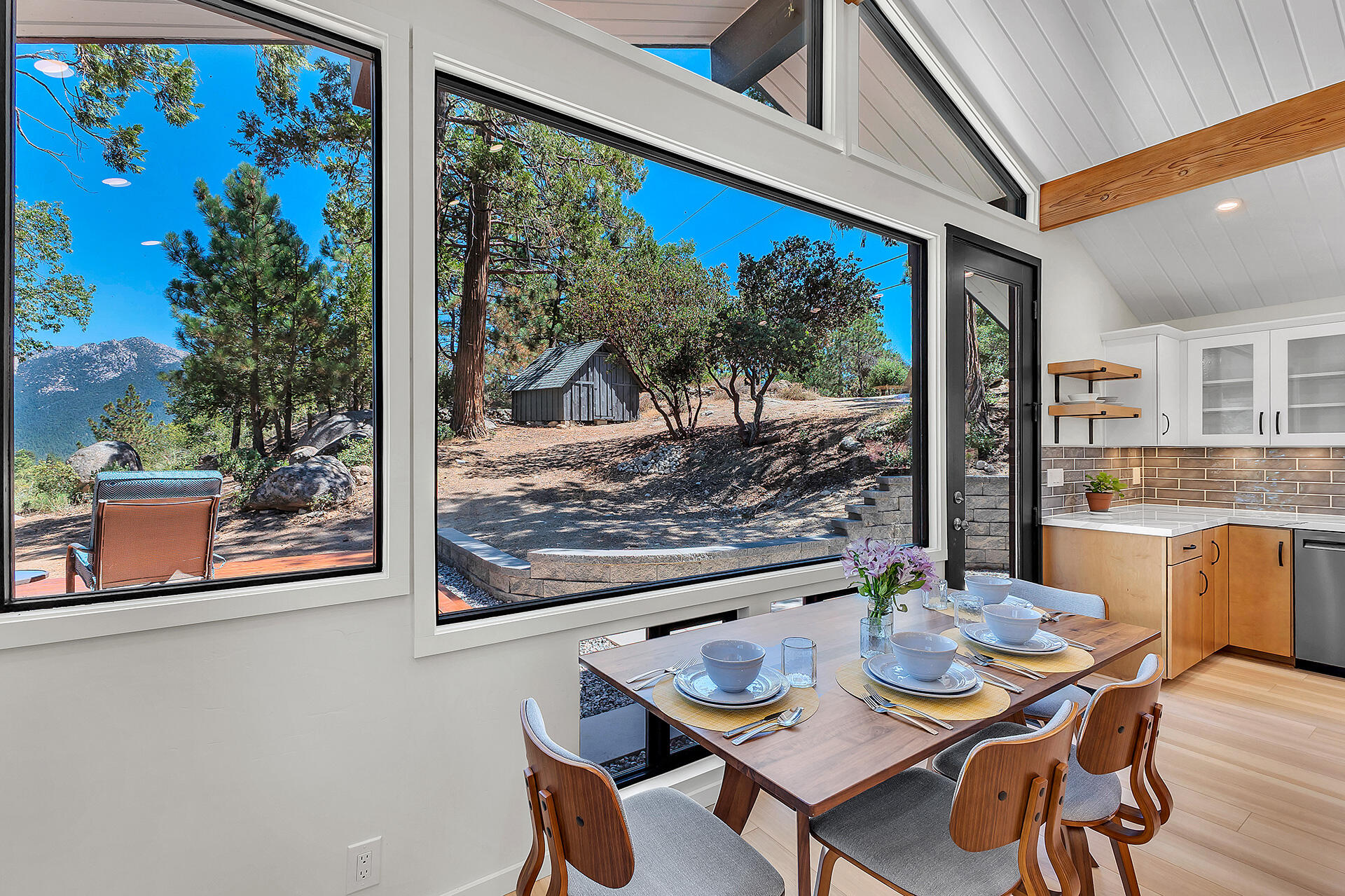 52600 Double View Drive Idyllwild, CA 92549 - Photo 29 of 75 a view of a dining room with furniture window and outside view