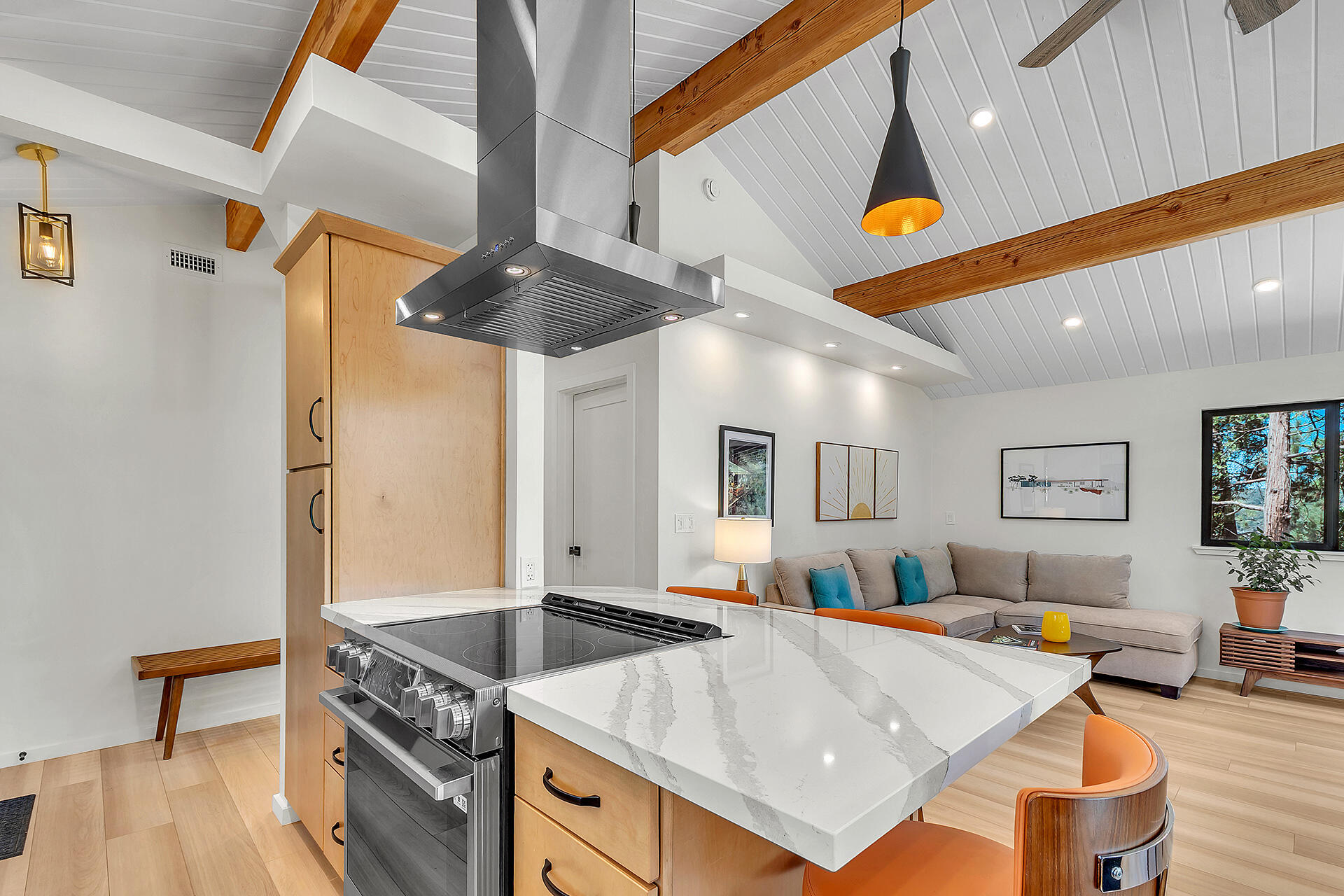 52600 Double View Drive Idyllwild, CA 92549 - Photo 41 of 75 a living room with stainless steel appliances kitchen island a table and chairs in it