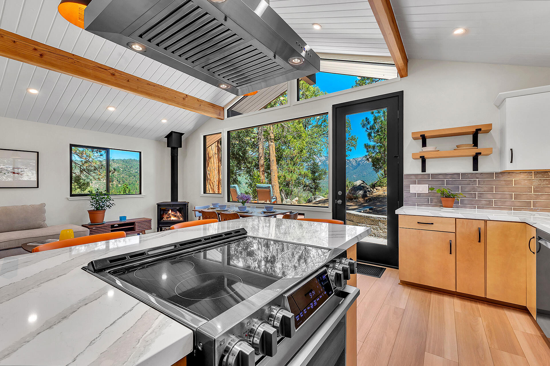 52600 Double View Drive Idyllwild, CA 92549 - Photo 43 of 75 a kitchen with large windows and refrigerator