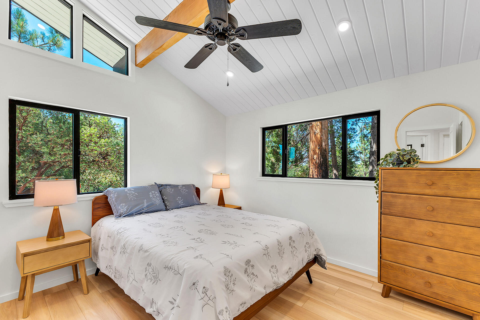 52600 Double View Drive Idyllwild, CA 92549 - Photo 47 of 75 a bedroom with a bed a dresser next to a window