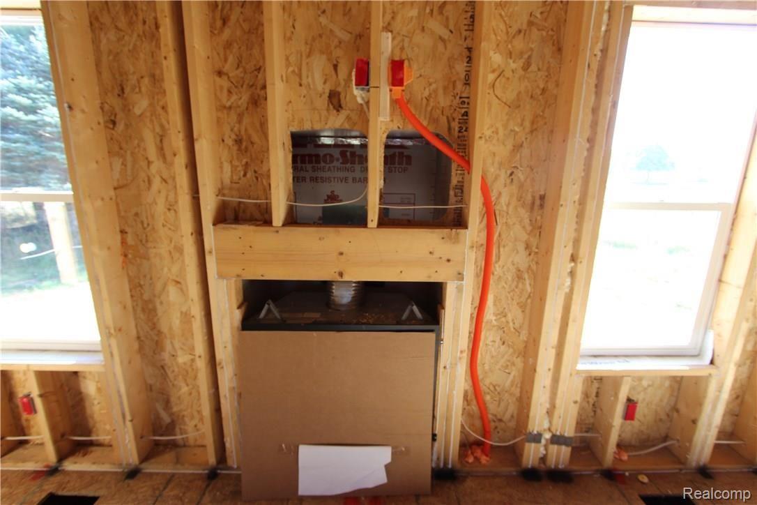 317 Triangle Lake Road Howell, MI 48843 - Photo 43 of 73 HDMI Cable box for TV above Fireplace