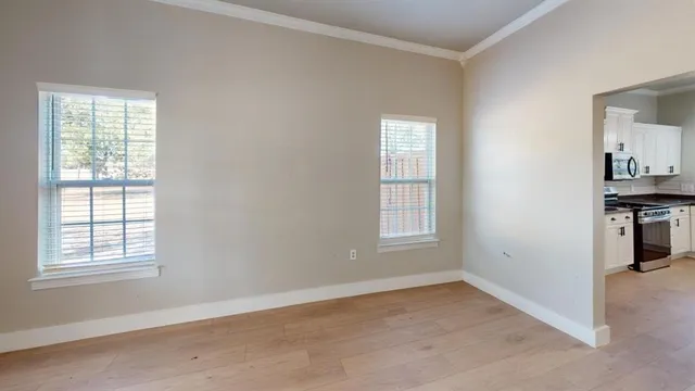 an empty room with windows