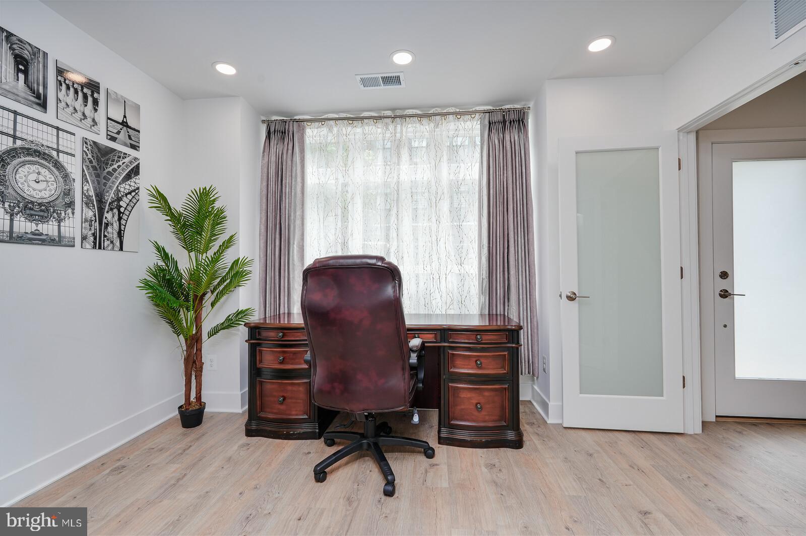 5345 Zenith Overlook Bethesda, MD 20816 - Photo 4 of 53 a view of workspace with furniture and a potted plant