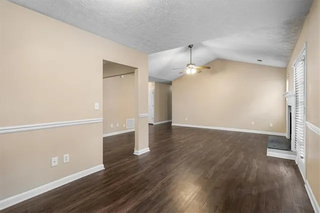 a view of a livingroom with wooden floor