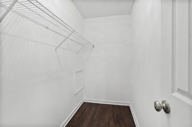 a view of a room with racks on the wall