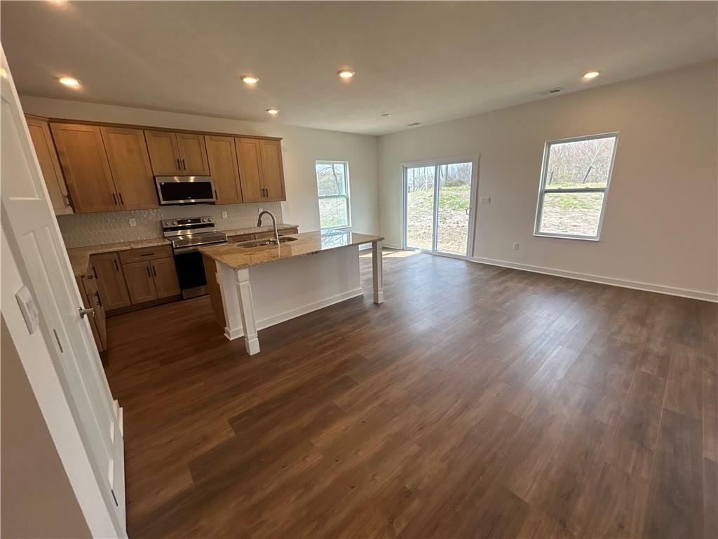 121 July Drive Butler, PA 16002 - Photo 11 of 22 a kitchen with stainless steel appliances a refrigerator sink and microwave