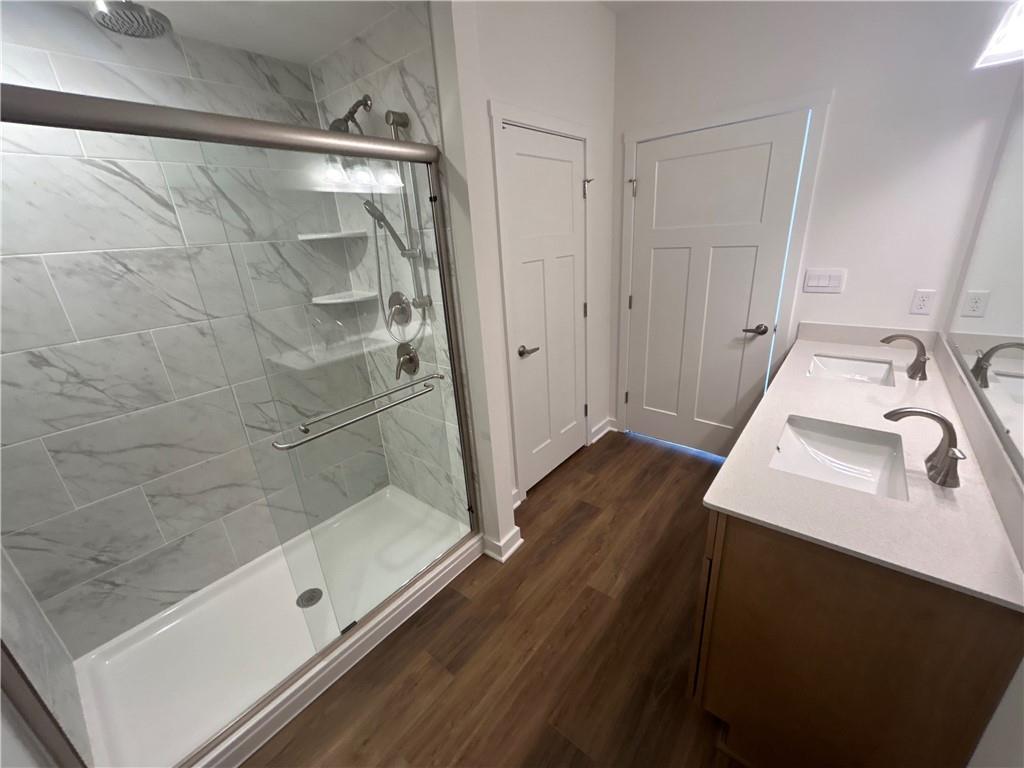 121 July Drive Butler, PA 16002 - Photo 20 of 22 a bathroom with a sink and a mirror