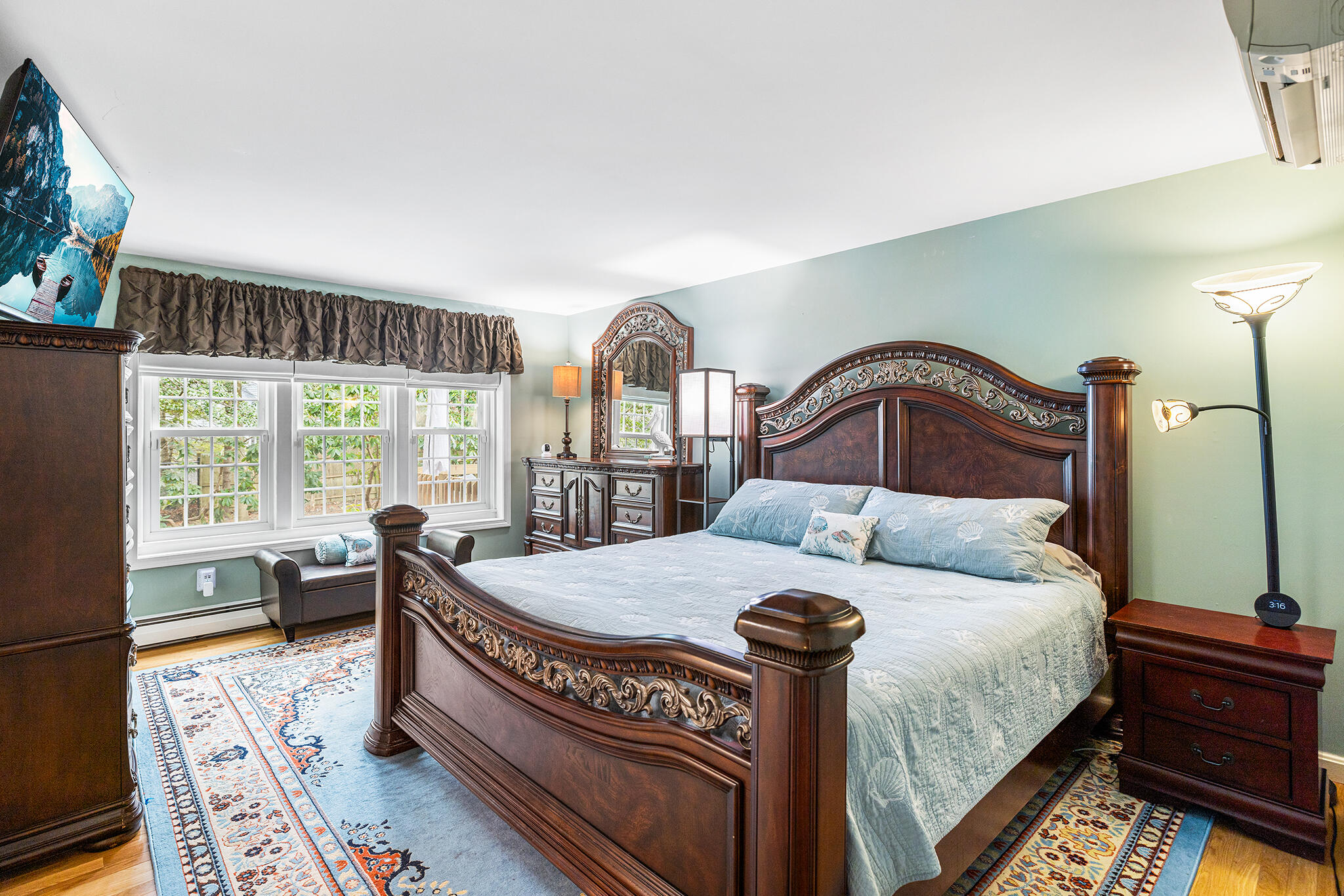 175 Old Post Road Centerville, MA 02632 - Photo 11 of 28 a bedroom with a bed and a large window