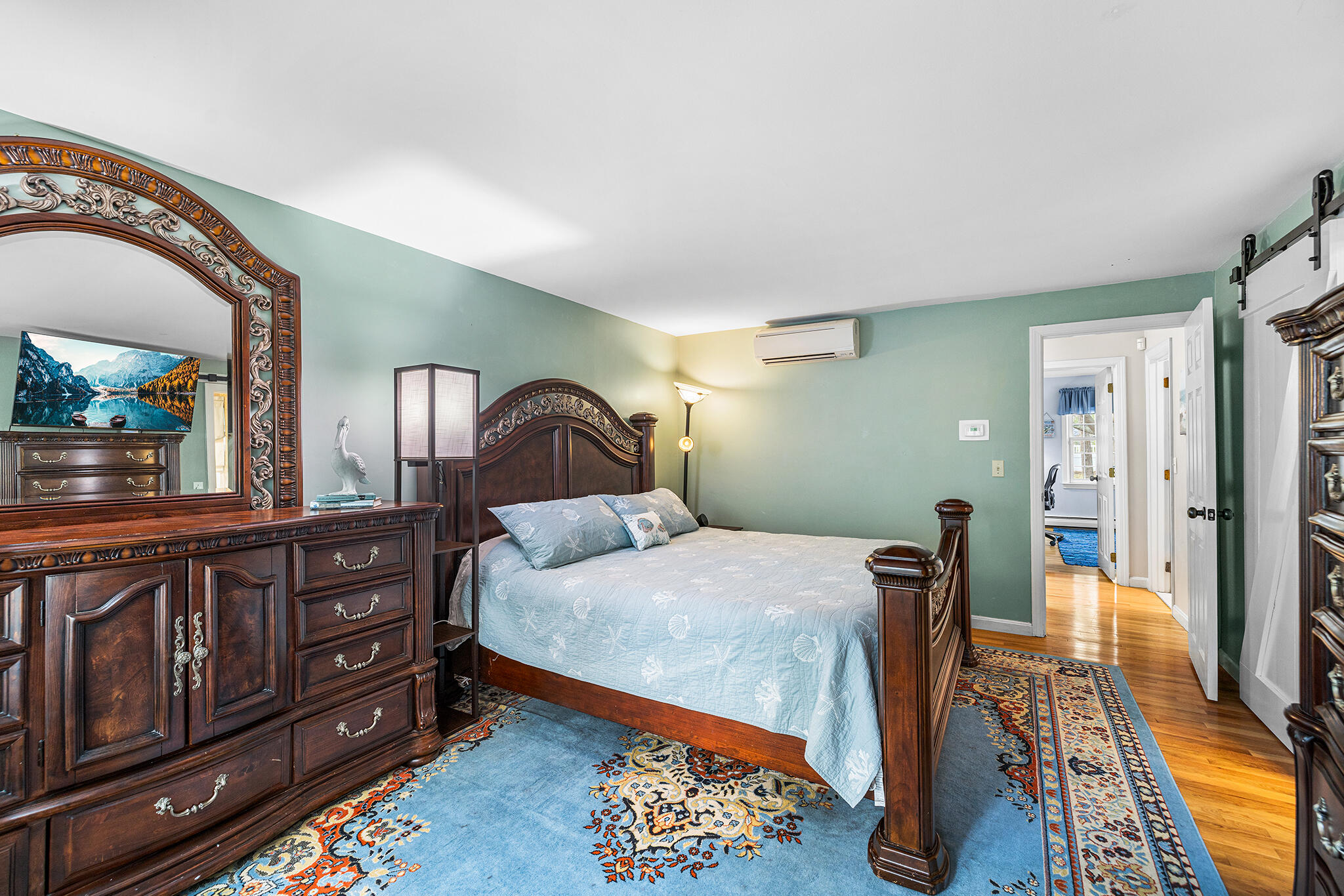 175 Old Post Road Centerville, MA 02632 - Photo 12 of 28 a bedroom with a bed and wooden floor