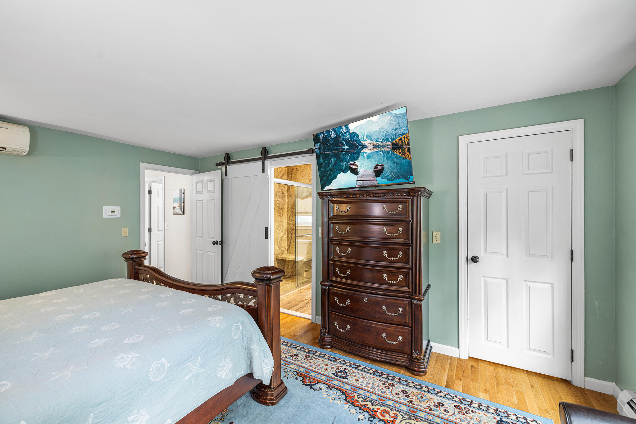175 Old Post Road Centerville, MA 02632 - Photo 13 of 28 a bedroom with a bed and a dresser