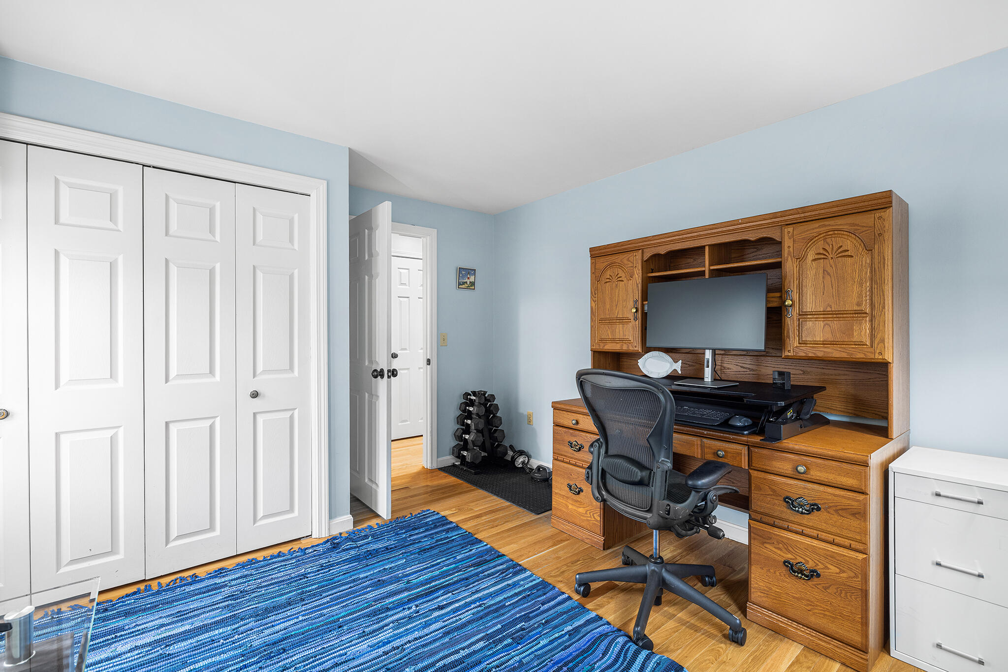 175 Old Post Road Centerville, MA 02632 - Photo 19 of 28 a view of workspace with wooden floor shelves