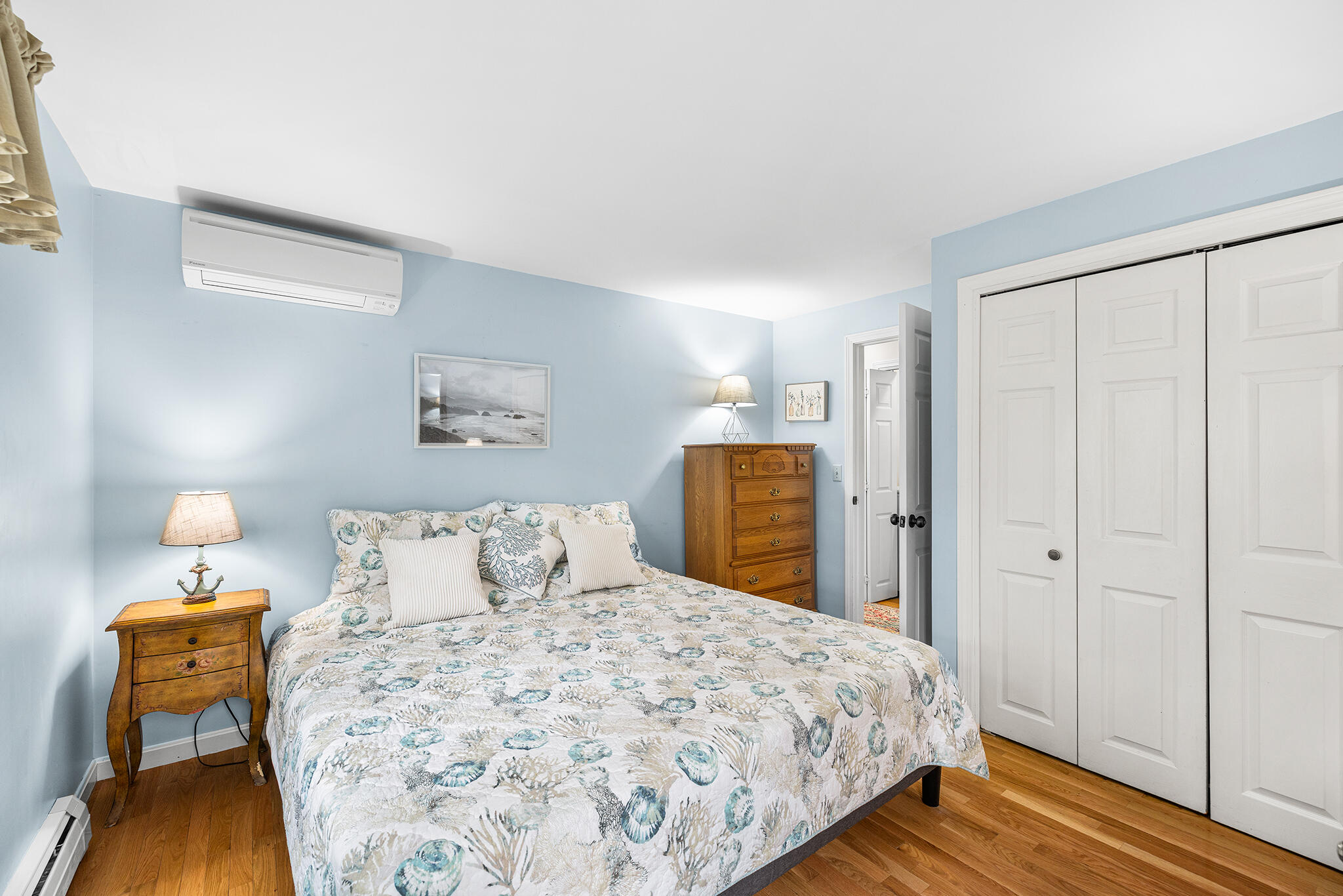 175 Old Post Road Centerville, MA 02632 - Photo 20 of 28 a bedroom with a bed and wooden floor