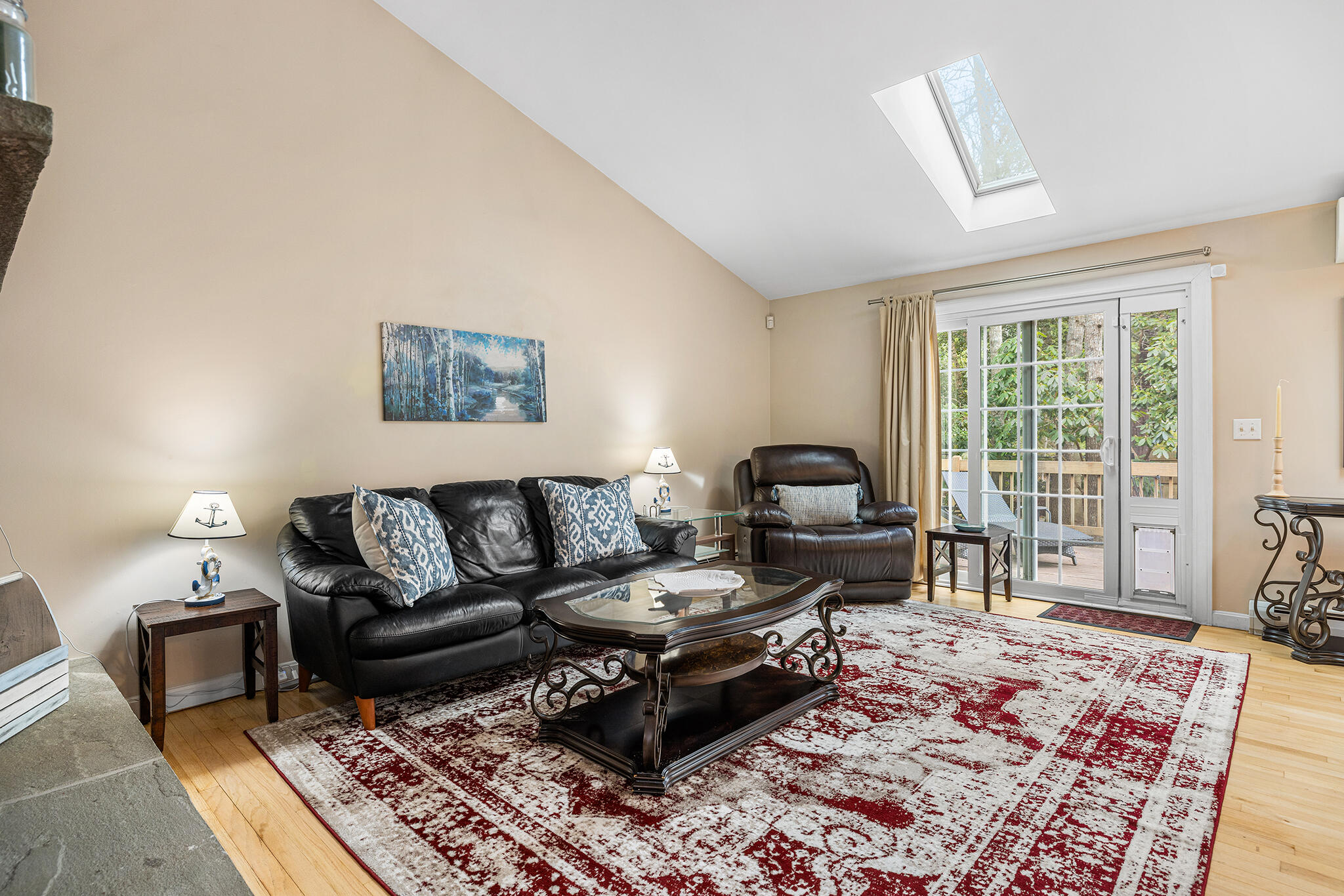 175 Old Post Road Centerville, MA 02632 - Photo 2 of 28 a living room with furniture and a rug